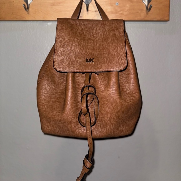Michael Kors leather backpack/purse with adjustable straps and magnetic closure. - Picture 1 of 5